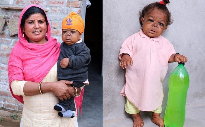 Aikuinen intialainen kuuden kuukauden ikäisen vauvan kanssa